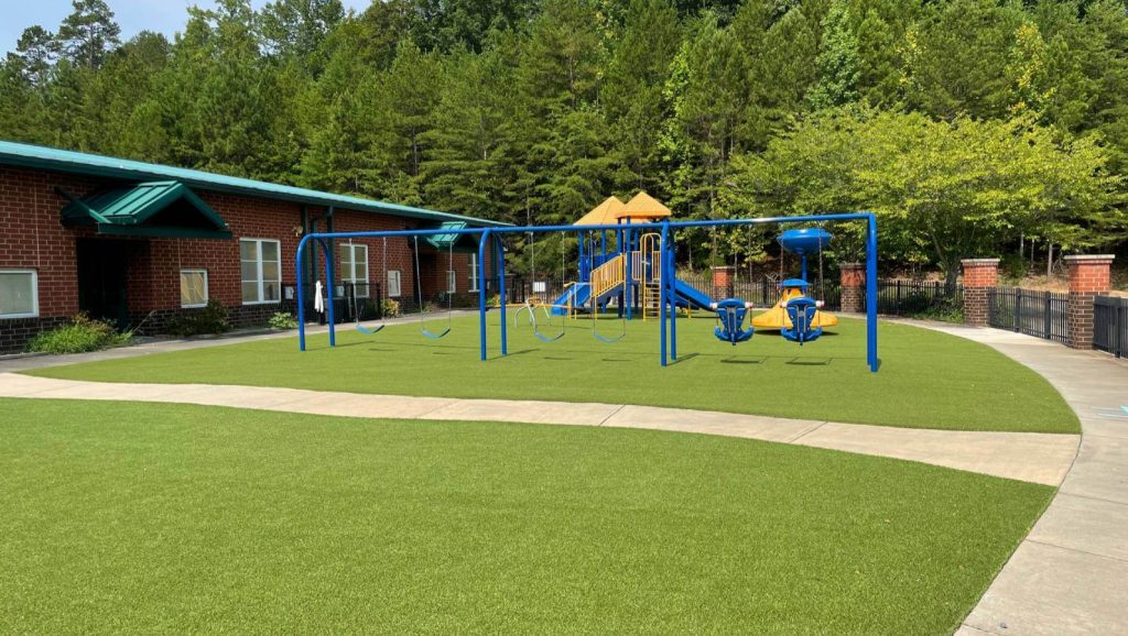 SYNLawn Carolina's is currently converting the School District of Fort Mill, South Carolina to SYNLawn Artificial Grass. SYNLawn Carolina has replaced nearly 150,000 square feet of natural playgrounds, courtyards, batting cages, and failing PIP Rubber to SYNLawn Artificial Grass to increase safety and functionality and the number is continuing to grow.